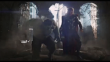 Hulk hits Thor after defeating alien